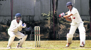 A match in action during the 30th All India Uttarakhand Gold Cup Cricket Tournament in Dehradun on Sunday.