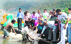 A cleanliness drive at Naini Lake at Nainital on Sunday