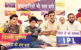 Former cricketer and BJP MP Kirti Azad sits on a hunger strike against IPL outside the Feroz Shah Kotla Stadium in New Delhi on Sunday
