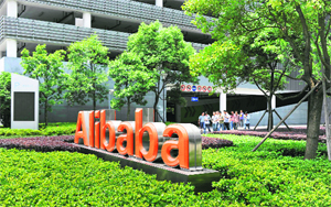 Chinese workers walk out from the Alibaba head office building in Hangzhou, in eastern China's Zhejiang province on Monday