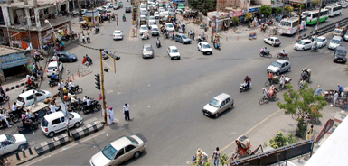 As the summer sun beats down harsh, the traffic cop deployed at the busy Hanuman Chowk in Bathinda performs his duty without the comfort of any canopy or shelter.