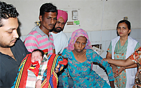 The lady, who went into labour aboard the Jammu-Tawi Express, delivered a baby girl at the Women and Children Hospital in Bathinda on Monday.