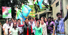 Activists of the NSUI hold a protest in Dehradun on Monday.