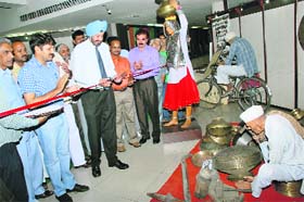 Lt-Gen Dr DDS Sandhu, Vice-Chancellor, Kurukshetra University, inaugurates an exhibition on International Museum Day at Dharohar Haryana Museum in Kurukshetra