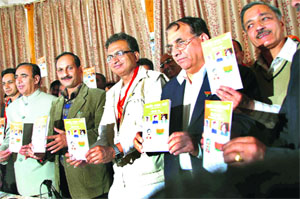 BJP leaders release the party manifesto in Shimla on Monday.