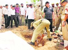 The police exhumes the body of Ghulam Rasool from the Kotbalwal area of Jammu. 