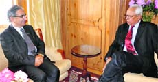 Minister for Agriculture Ghulam Hassan Mir and Governor NN Vohra during a meeting at Raj Bhawan in Srinagar on Monday. 