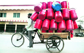 A man on his way to supply water coolers on a hot Monday afternoon in Jalandhar.