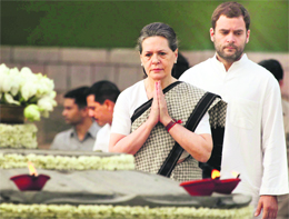 Congress president Sonia Gandhi and her son Rahul Gandhi pay floral tribute to former Prime Minister Rajiv Gandhi on his 21st death anniversary at Vir Bhumi in New Delh