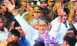 Sri Lankas former army chief General Sarath Fonseka leaves the main prison in Colombo on Monday.  AFP