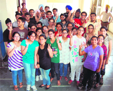 Students who have cleared entrance examinations for medicine courses celebrate their success at a local coaching institute in Amritsar on Tuesday. 