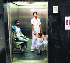 A lift at work in the Civil Hospital in Amritsar on Tuesday. 