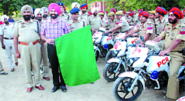 SSP Sukhchain Singh Gill flagging off the 25 newly-painted PCR motorbikes in Bathinda on Tuesday.