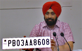 DTO, BM Singh, shows a high security registration plate in Bathinda on Tuesday.