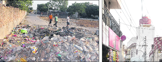 A garbage dump; and (right) high-tension wires pass close to the rooftops of houses in Ward 15.