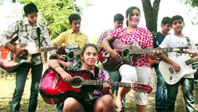 Participants perform during the Guitar Solo Competition at the Government Polytechnic College, Bikram Chowk, in Jammu on Tuesday.