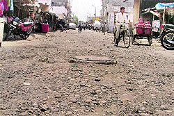 A dilapidated road at Guru Hargobind Nagar