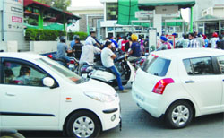 Huge rush at a petrol filling station in Amritsar on Wednesday. 