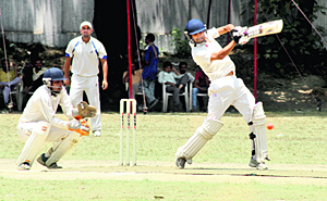 A batsman in action in a match during the 30th All-India Uttarakhand Gold Cup Cricket Tournament in Dehradun