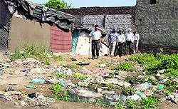 Ludhiana Civil Surgeon, Dr Subash Batta, along with other officials of the health department, on a surprise visit to check conditions in jhuggis near Salem Tabri in Ludhiana on Wednesday