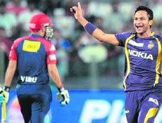 Delhi Daredevils batsman Virender Sehwag walks back after getting out during the IPLs first play-off match against Kolkata Knight Riders in Pune. 