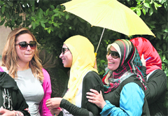 Women outside a polling station in Cairo on Wednesday.  AFP