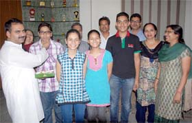 Students of Lord Rama Public School celebrate their success in the CBSE class X exams on Thursday night