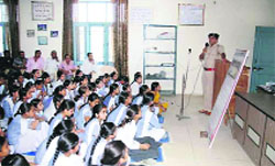 Satish Kumar, SHO, Traffic, Kurukshetra District, addresses students at a workshop on road safety organised by the National Highway and Traffic, Haryana State, in Kurukshetra.