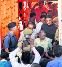 Delhi Chief Minister Sheila Dikshit comes out after offering prayers at the Raghunath temple in Jammu on Thursday. 