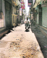 An uncarpeted road at ward number 36.