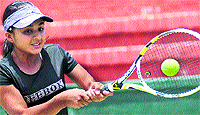 Aarushi in action during a match held at the CLTA, Sector 10, Chandigarh, on Friday