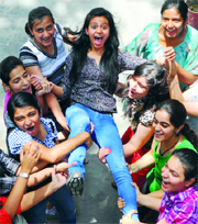Students celebrate their success in CBSE Class X exam in New Delhi on Friday.