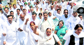 INLD activists hold a protest in Karnal