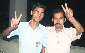 Ratan Ravat with his father Arjun Ravat after getting the CGPA 10 in the recently declared CBSE Class X results. 