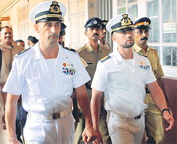 Italian marines Massimiliano Latorre (left) and Salvatore Girone at a court in Kollam on Friday. 