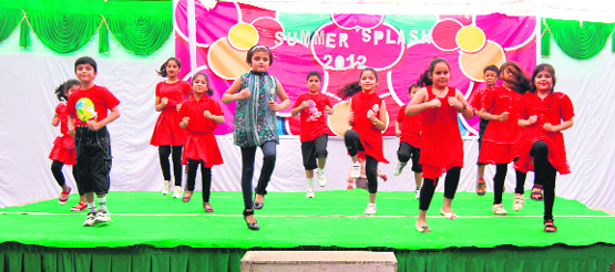 Students perform during a summer camp at Delhi Public School in Dehradun on Saturday. 