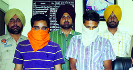 The two accused in the police custody in Amritsar on Sunday.