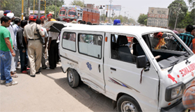 The ambulance rammed into a Maruti car on Bhatti road after its driver tried to jump the red light at the traffic intersection on Sunday.