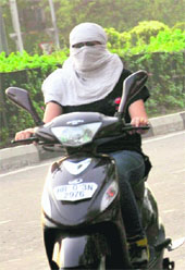 A young girl braves the ongoing heat wave in Panchkula
