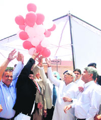 Chief Minister Bhupinder Singh Hooda releases balloons after laying the foundation stone for a district alternative dispute resolution centre in Bhiwani on Sunday.