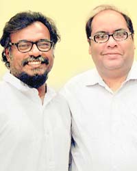 Paint it red: Johny ML and Annurag Sharma Photo: Pradeep Tewari
