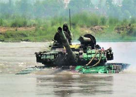 An Army vehicle moves through Sutlej waters as part of the ongoing annual exercise in Punjab on Sunday