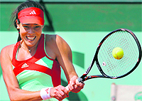 Serbias Ana Ivanovic hits a return to Spains Lara Arruabarrena Vecino during their match at the Roland Garros stadium in Paris on Sunday