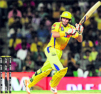 Chennai Super Kings Michael Hussey plays a shot during the final against Kolkata Knight Riders in Chennai