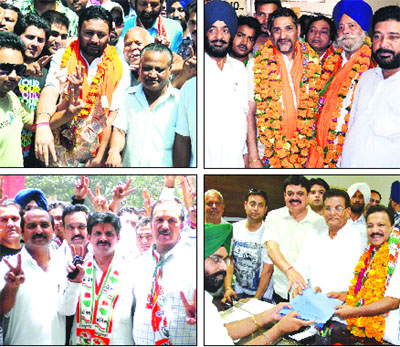 (From top left clockwise) BJP candidate from Ward 19 Damandeep Singh, BJP candidate from Ward 61 Dr Anoop, Congress candidate from Ward 8 Ranjan Aggarwal and Congress candidate from Ward 14 Ram Sharan file nomination papers for contesting the Municipal Corporation elections in Amritsar on Monday. 
