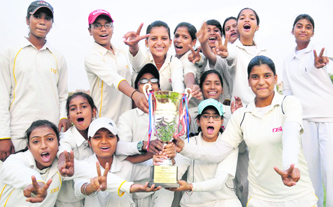 Members of the LIC Cricket Club after winning womens final match on Monday