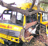 A bus belonging to a school at Ratia after it hit a tree near Rattangarh village in Fatehabad. 