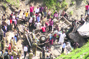 The mangled remains of the Matador that fell into a gorge in Banihal on Monday.