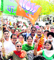 Sitting councillor from Ward 16 Arjun Pappi on his way to file nomination papers in Jalandhar on Monday.