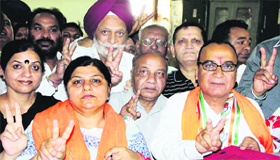 Couple Jagdish Raj Raja and Anita Raja in the SDM office during filing of nomination papers from MC Wards 36 and 37, respectively; sitting Deputy Mayor